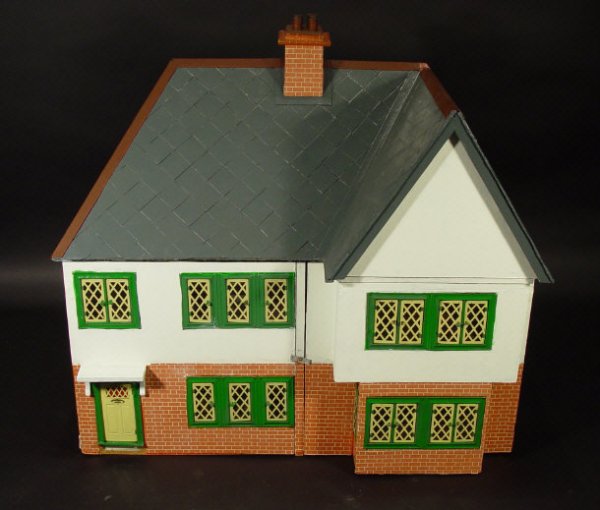 Tri-ang 1960s double aspect doll's house on a rev