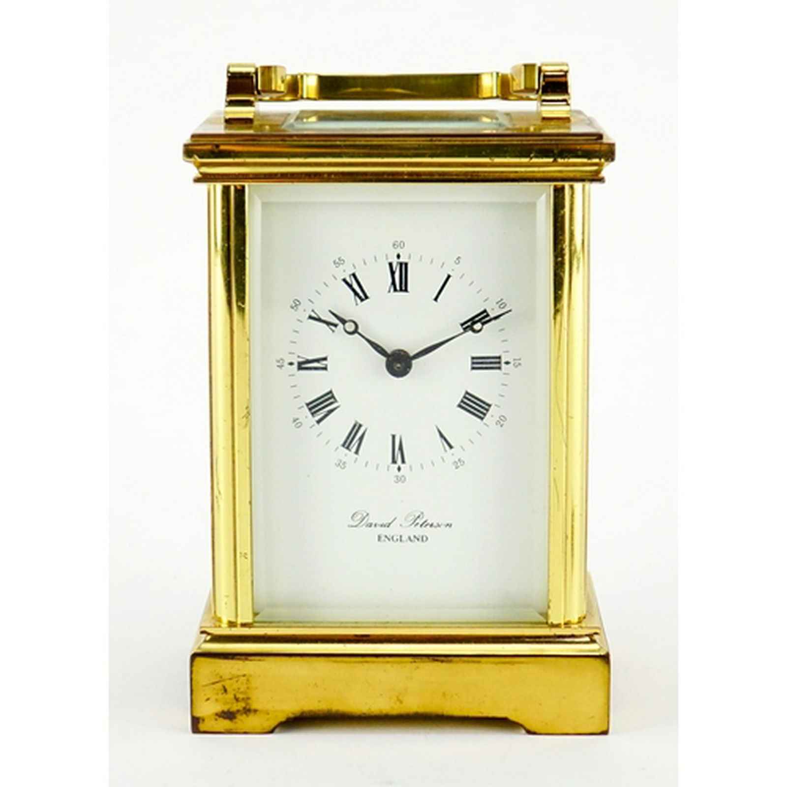 David Peterson brass cased carriage clock striking on a: David Peterson brass cased carriage clock striking on a bell, with Roman and Arabic numerals, 11.5cm high