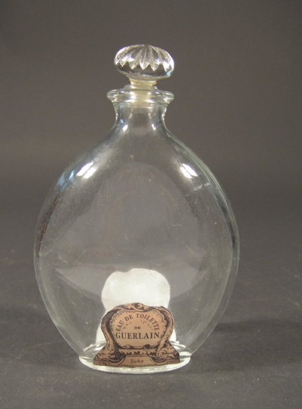 Baccarat Art Deco glass scent bottle produced for: Baccarat Art Deco glass scent bottle produced for Guerlain with paper labels and moulded factory mark, 16cm high
