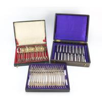 Set of eighteen German silver knives, forks and spoons,: Set of eighteen German silver knives, forks and spoons, all housed in a velvet and silk lined tooled leather boxes, the blades impressed Grieshaber, the forks 662.0g, each 18cm in length, the knives 1