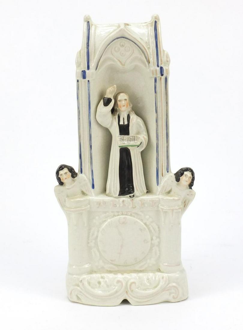 Victorian Staffordshire figure of John Wesley at his: Victorian Staffordshire figure of John Wesley at his pulpit, 28.5cm high