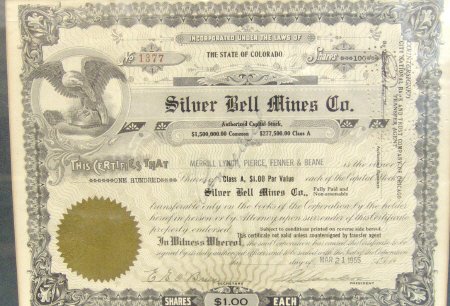 Three American share certificates - The Silver Bel: Three American share certificates - The Silver Bell Mines Co, Playboy Enterprises Inc and Midland Construction Company, each framed: NB. All items are sold as is. Please contact the auctioneer request