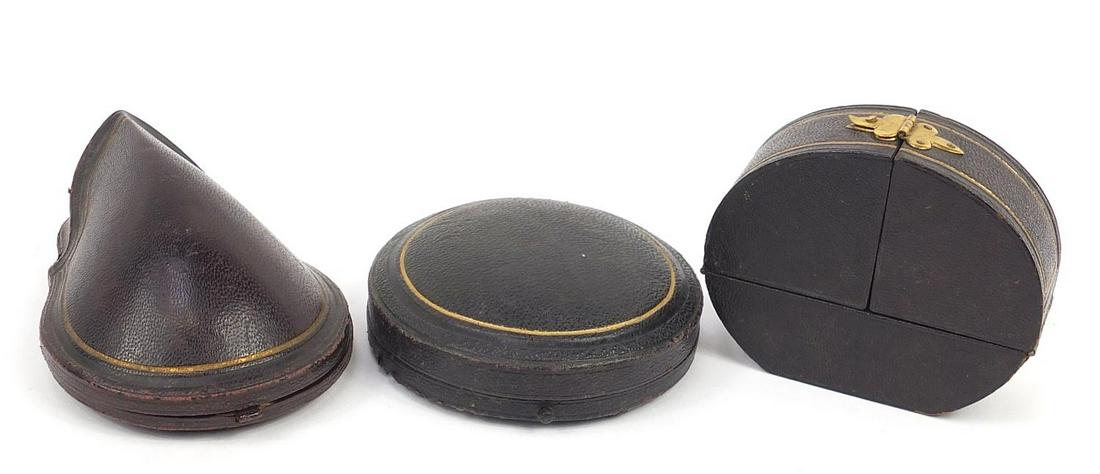 Three 19th century tooled leather velvet and silk lined: Three 19th century tooled leather velvet and silk lined fitted jewellery boxes comprising Hamilton & Inches, Hall & Co and Barber & Smith, the largest 10cm wide