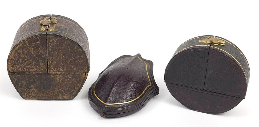 Three 19th century tooled leather velvet and silk lined: Three 19th century tooled leather velvet and silk lined fitted jewellery boxes including W Thornhill & Co, the largest 7.5cm high