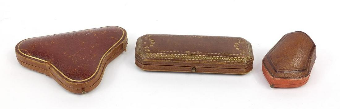 Three 19th century tooled leather velvet and silk lined: Three 19th century tooled leather velvet and silk lined jewellery boxes including Barber & Smith and Mon C Villard, the largest 12cm wide