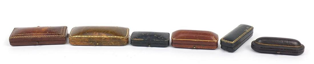 Six 19th century velvet and silk lined jewellery boxes,: Six 19th century velvet and silk lined jewellery boxes, some tooled leather examples including Spires & Sons Ltd, B Barnett Ltd and Parkes London, the largest 9cm wide
