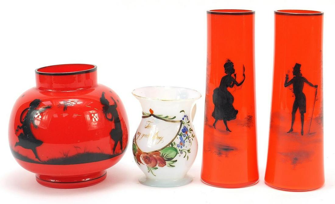 19th century glassware including an opaline baluster: 19th century glassware including an opaline baluster mug inscribed 'for my good boy' and three red glass vases hand painted with silhouettes, the largest each 19.5cm high