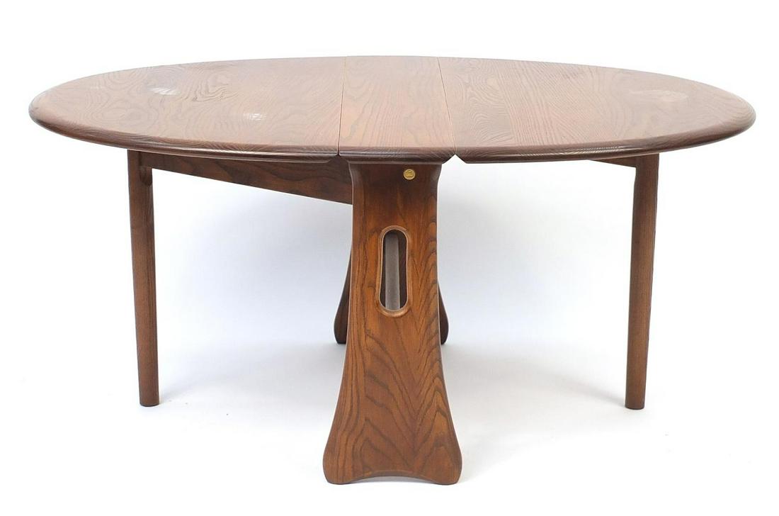 Ercol elm oval drop leaf coffee table, 47cm H x 100cm W: Ercol elm oval drop leaf coffee table, 47cm H x 100cm W (open) x 70cm D