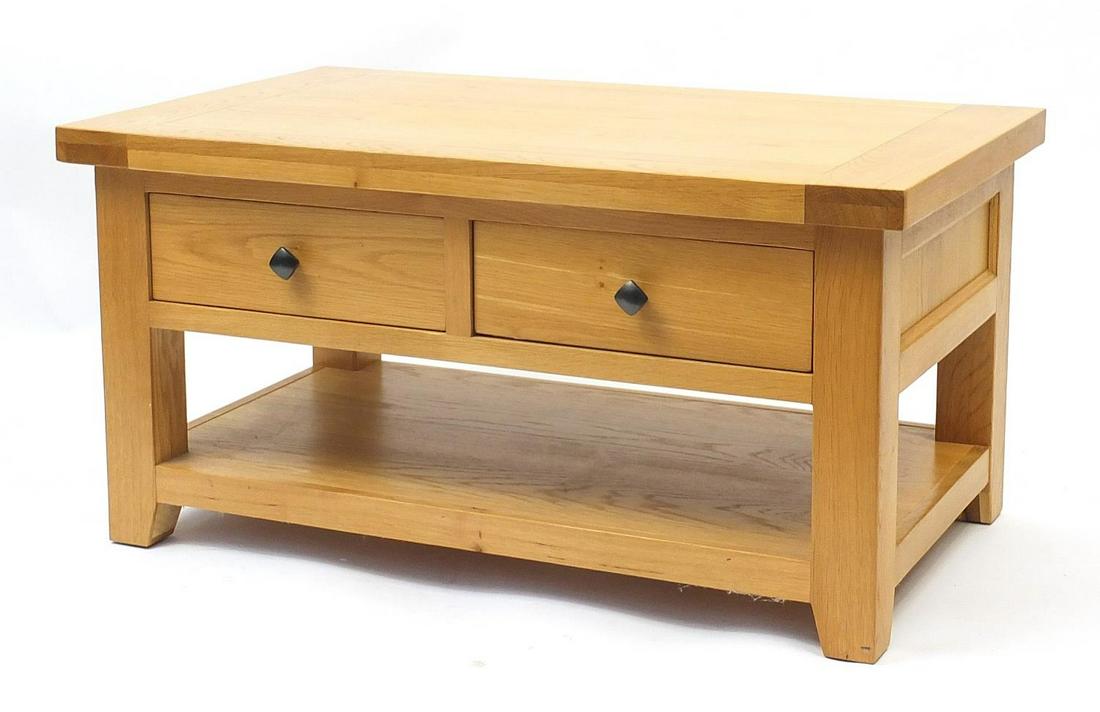 Contemporary light oak low table fitted with two frieze: Contemporary light oak low table fitted with two frieze drawers and under shelf, 50cm high x 100cm W x 60cm D