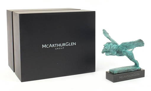 Mark Coreth for McArthur Glen Group, Ver...: Mark Coreth for McArthur Glen Group, Verdigris bronze study of a winged lion raised on a rectangular slate base with box, 18.5cm in length