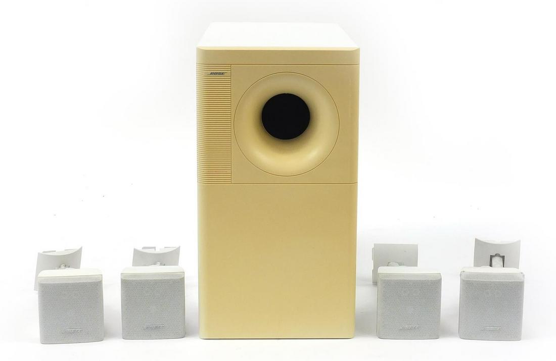 Bose Acoustimass 6 series 2 home theatre speaker system: Bose Acoustimass 6 series 2 home theatre speaker system including the Acoustimass module, four mini wall mounted Bose speakers and power leads, the largest 36cm H x 19cm W x 44cm D