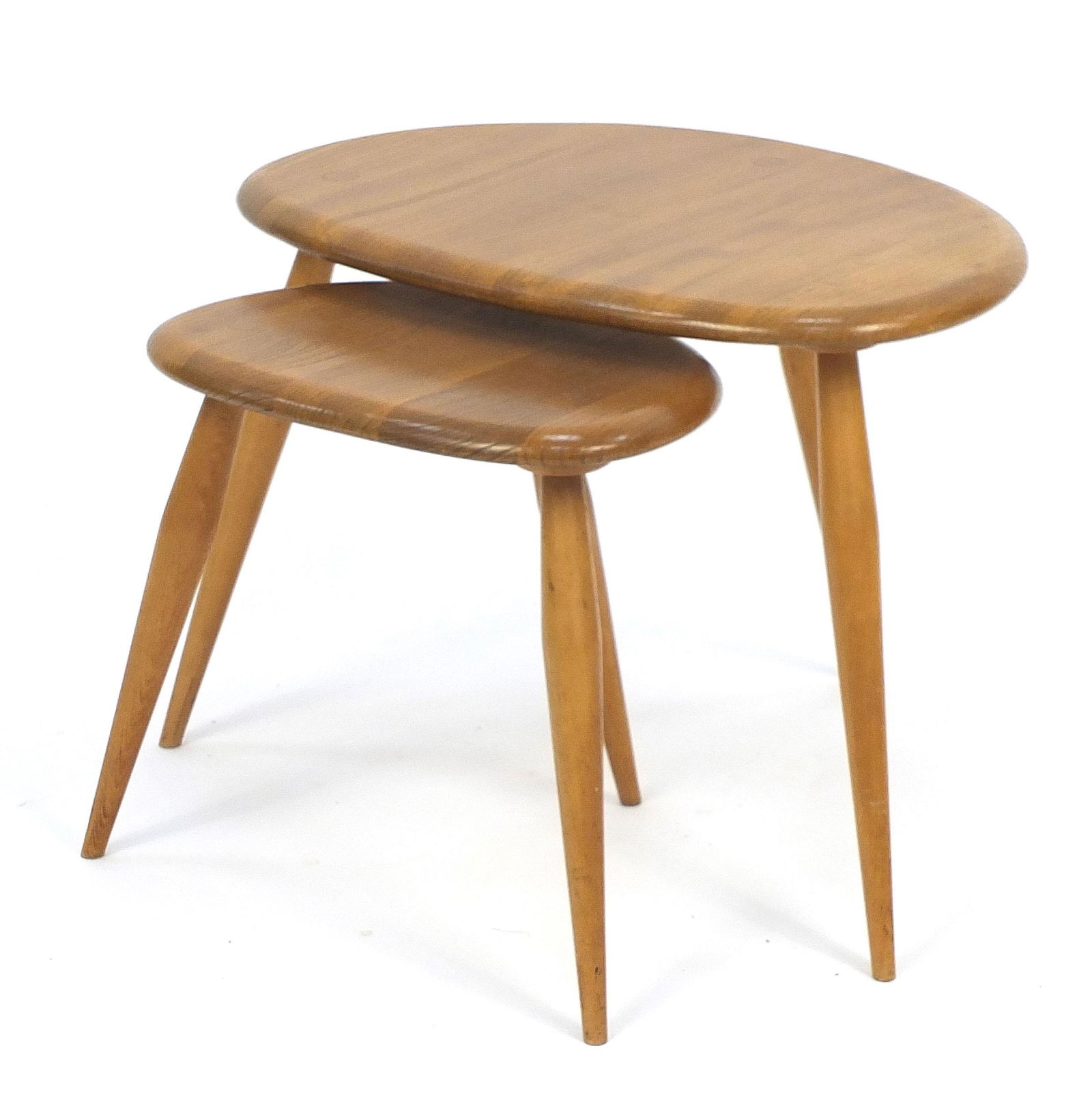 Two vintage Ercol light elm pebble occasional tables,: Two vintage Ercol light elm pebble occasional tables, the largest 36cm H x 49cm W x 34D