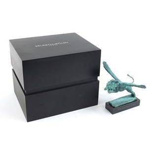 Mark Coreth for McArthur Glen group Verdigris bronze study of a winged lion raised on a rectangular: Mark Coreth for McArthur Glen group Verdigris bronze study of a winged lion raised on a rectangular slate base with box, 26.5cm wide