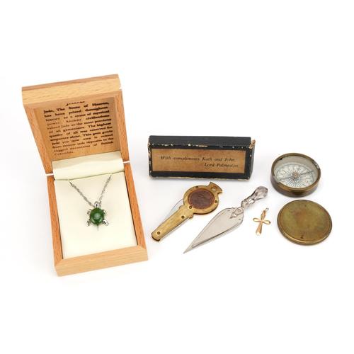 Objects and jewellery including 9ct gold cross pendant, jade tortoise pendant on chain, novelty cake: Objects and jewellery including 9ct gold cross pendant, jade tortoise pendant on chain, novelty cake slice bookmark and a pocket compass