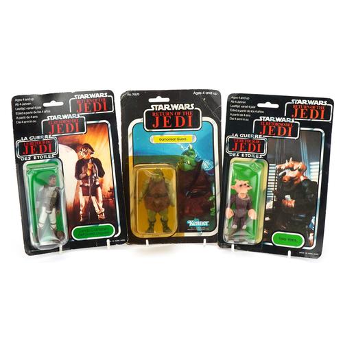 Three Star Wars Return of the Jedi action figures housed in sealed blister packs comprising: Three Star Wars Return of the Jedi action figures housed in sealed blister packs comprising Ree-Yees, Gamorrean Guard and Lando Carlissian