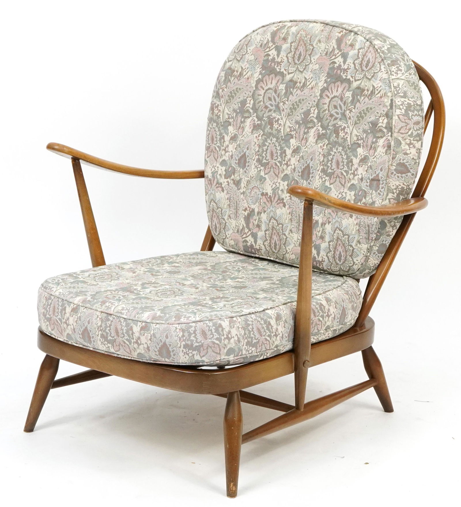 Ercol Windsor elm and beech armchair with floral lift off cushions, 76cm high: Ercol Windsor elm and beech armchair with floral lift off cushions, 76cm high