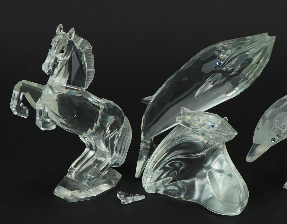Four Swarovski Crystal animals comprising unicorn, rearing horse, dolphin with calf and whale with (#1146) on Mar 15, 2023 | Eastbourne Auctions in East Sussex Four Swarovski Crystal animals comprising unicorn, rearing horse, dolphin with calf and whale with (#1146) on Mar 15, 2023 | Eastbourne Auctions in East Sussex