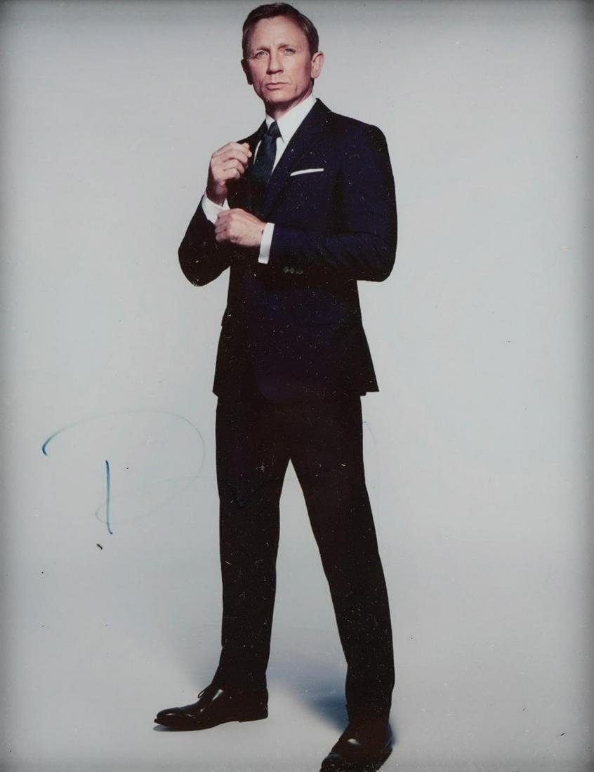 Two James Bond interest Daniel Craig photographs including Spectre and one signed in ink by the: Two James Bond interest Daniel Craig photographs including Spectre and one signed in ink by the actor