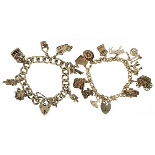 Two silver charm bracelets with love heart padlocks and a selection of mostly silver charms: Two silver charm bracelets with love heart padlocks and a selection of mostly silver charms including opening fire engine, carriage, typewriter and opening wishing well, total 104.8g