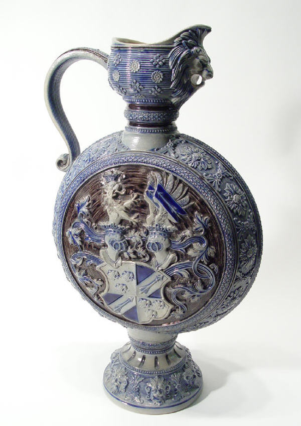106 Large German stoneware moon shaped ewer with lion 