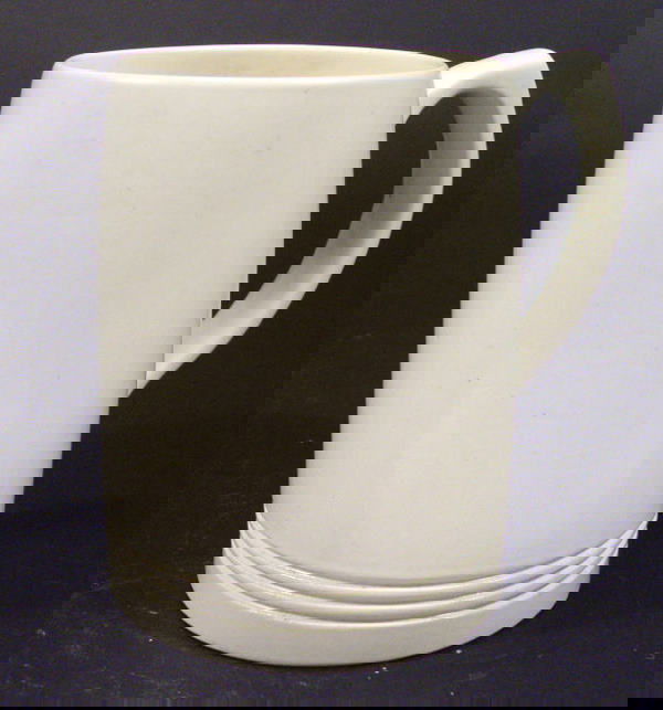 White glazed Keith Murray Wedgwood tankard, printe: White glazed Keith Murray Wedgwood tankard, printed factory marks and full signature to base, 12cm high