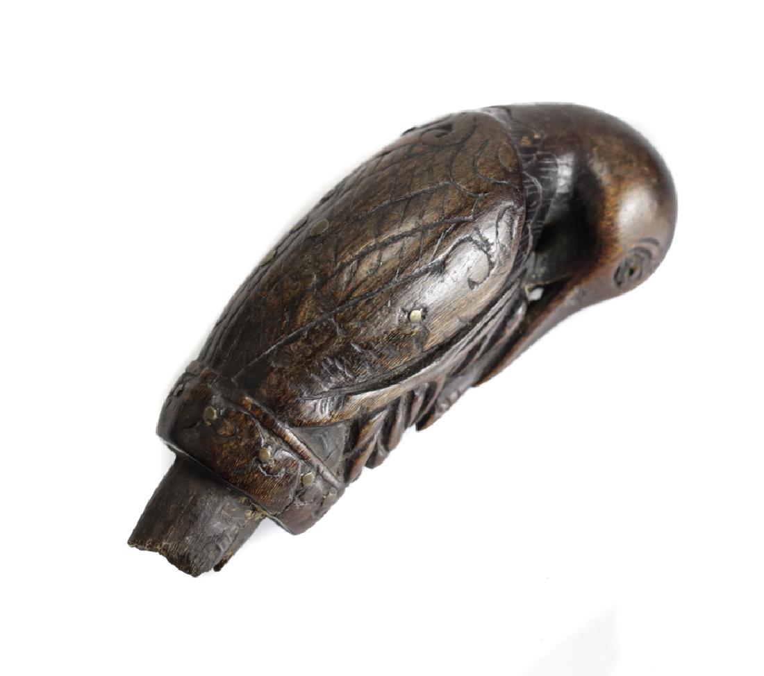 Antique Indonesian Wood Kris keris Hilt Handle bird: Indonesian wood Kris keris Hilt Handle 18th-19th Century? With brass tacks/ nailheads. Beautifully carved bird and snake, the bird with the snake in its beak. The kris or keris is a distinctive, asymm
