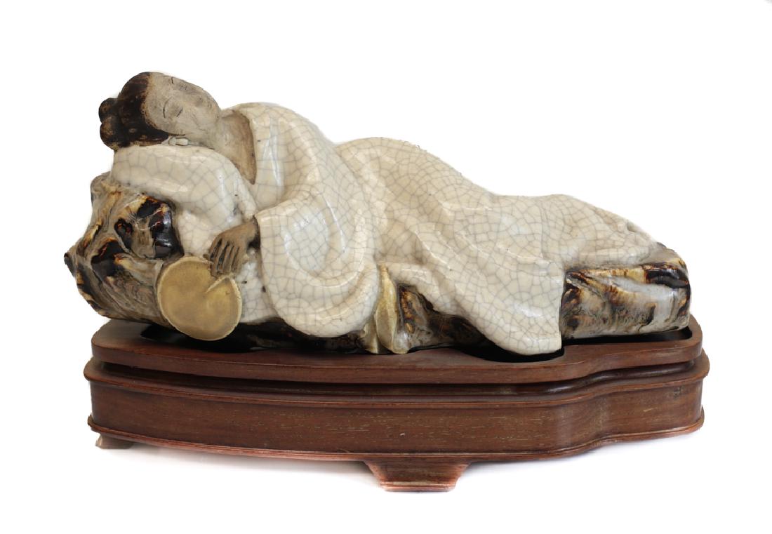 Chinese Shiwan Pottery Stoneware Figurine, reclining: Chinese Shiwan Pottery Stoneware Figurine, reclining woman with fan, 19th century, superb details, sleeping figure holds round fan. Cracquelure glaze on robe contrasts with the brown swirled glaze on 