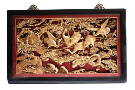 Chinese Gilt Wood wall carving: Chinese Gilt Wood wall carving, bronze mounts for hanging. Deeply carved cranes, foliage. Hand painted designs on lacquer frame. 30Lbs. 41.5” x 26” x 2”