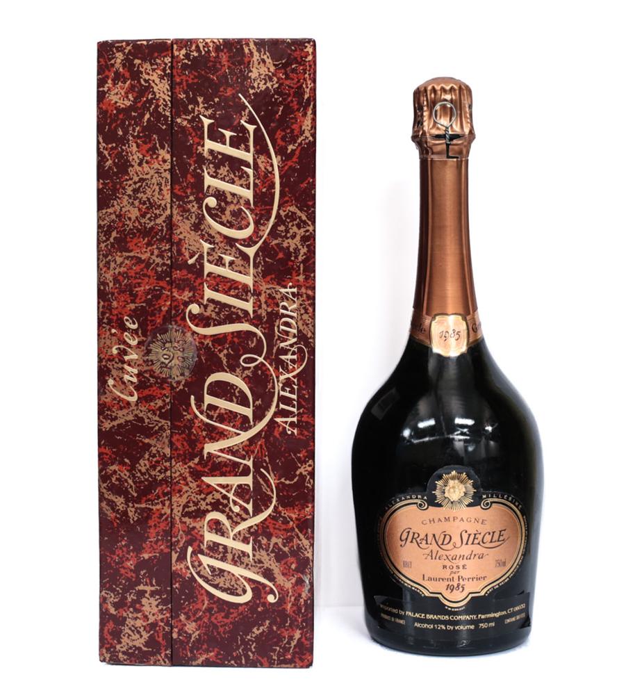 1985 Laurent-Perrier: 1985 Laurent-Perrier 'Alexandra' Grande Cuvee Rose, Champagne, France. Unopened and has the original labels. Comes in the original box as well. Contains 95- 100 to all of the wine. 750 ml. From a Sout