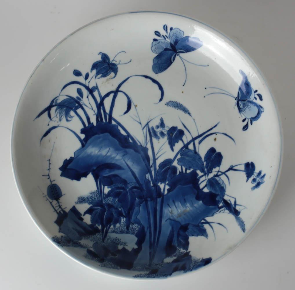Chinese Blue and White Porcelain Charger: Chinese Blue and White Porcelain Charger / Plate, Jiajing 1522-1566 dynasty marks within a double circle (most likely â€˜apocryphalâ€™ marks) lush plants and florals, butterflies, insects. Ma