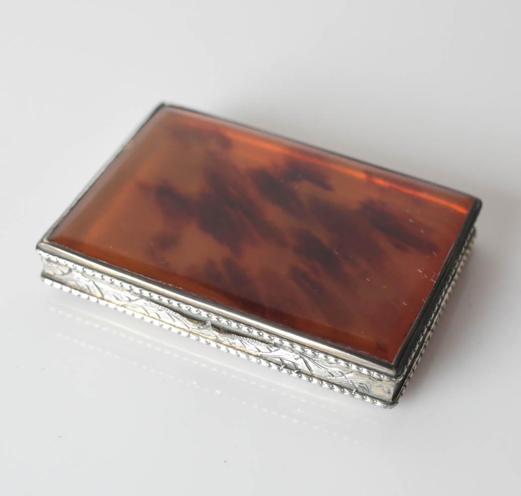 .800 Silver mounted Tortoiseshell Card Case c1900: Finely made Tortoise Shell and .800 Silver mounted case or box, hand chased floral and foliate designs on silver. Circa 1900. Marked 800. Measures Approx. 3 x 2.2 x 0.5 inches.