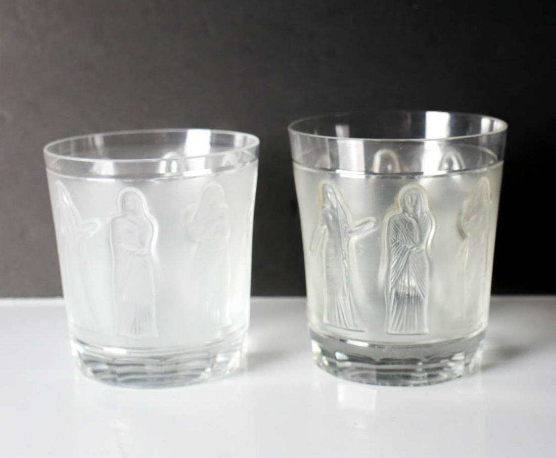2pc Lalique Femmes Antiques Glasses Old Fashioned: Lalique Femmes Antiques Glasses Old Fashioned Tumblers Glasses. Female figures in reverse relief. Marked 'Lalique France" on base. Weight 1.6lb Measures Approx., 4" height x 3.5 in diameter at rim; 3.