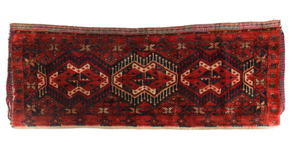 19th Century Turkoman / Turkmen Saddleback Rug: Handknotted 19th Century Turkoman / Turkmen Saddleback Rug. Low pile with rust red field, blues, tan geometric designs. Weight Approx., 3.5lbs.Measures: 20 x 49 inches