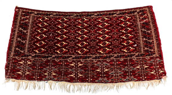 Antique c1900 Turkoman / Turkmen Tribal Rug: A c1900 Handknotted Turkoman / Turkmen rug women in rows of guls on dark red ground with ivory detailing.Measures Approx: 55.5 inches x 27.5 inches