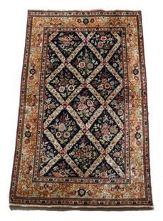 c1950 Silk Qum Rug: A antique hand crafted c1950 silk qum rug of crossed design of floral patterns surrounding floral bouquets.Measures Approx: 59.5inches x 38inches