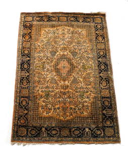 c1960 Silk Qum Rug: A antique hand crafted c1960 silk qum rug with a ivory floral field centered with a pedant medallion of dark cobalt blue with brown and olive details framed by a foliate border.Measures Approx: 63 x