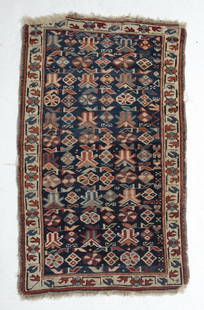 Antique Caucasian 19th century, Small Throw Rug: A fine Antique Handknotted Caucasian 19th century, Small Throw Rug, wool pile, geometric and florals in browns, tans, off-white, blues. Weight Approx., 3.5lbsMeasures Approx. 36inches w/out fringe x 2