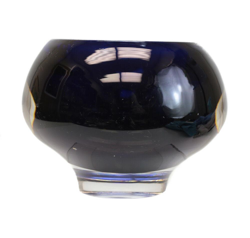 Kosta Boda Mona Morales Schildt Art Glass bowl, deep blue encased in clear: Kosta Boda Mona Morales Schildt Art Glass bowl, deep blue encased in clear. Marked 'Kosta SH 184' 6.0lbs Approx. Measurements: 4.5” height x 6” diameter.Domestic Shipping: $20