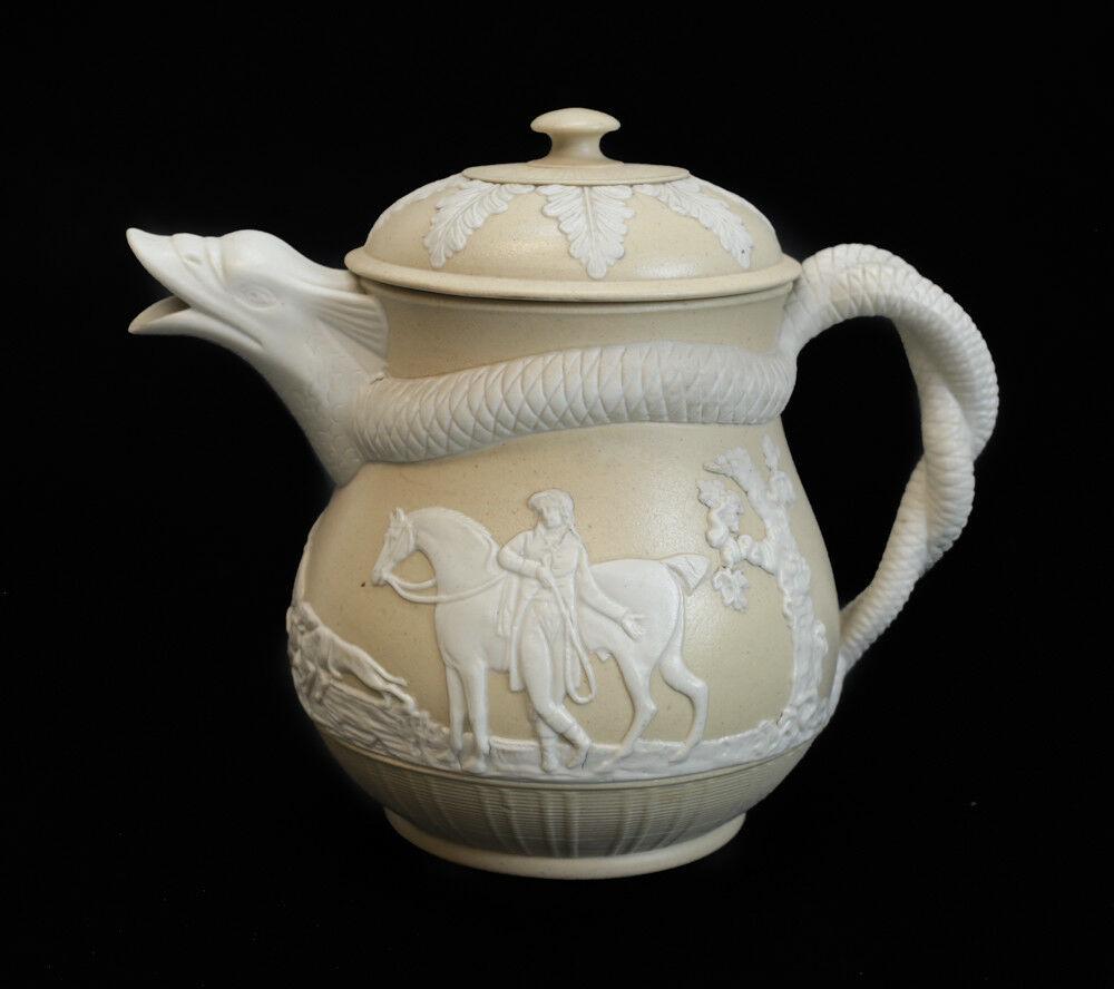 Glazed Staffordshire Stoneware (Caneware)19th century, possibly Wedgwood: Glazed Staffordshire Stoneware (Caneware?)18-19th century? possibly Wedgwood, unmarked. Buff and off white; stunning details, serpent form spout writhes around neck of pot and forms twined handle. Rai