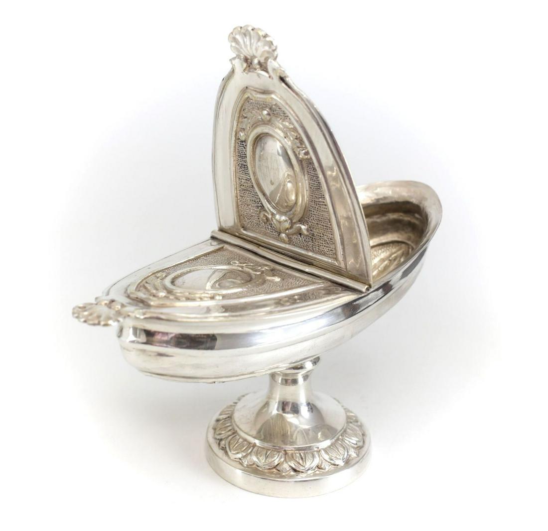 Silverplate Footed Myrrh and Incense / Essence Altar box 19th century: Continental Silverplate Footed Myrrh and Incense / Essence Altar box, 19th century, with single hinged lid. Hand chased, shell form handles. 1.5lbs Approx. Measurements: 8" length x 4.5" height x 3.75