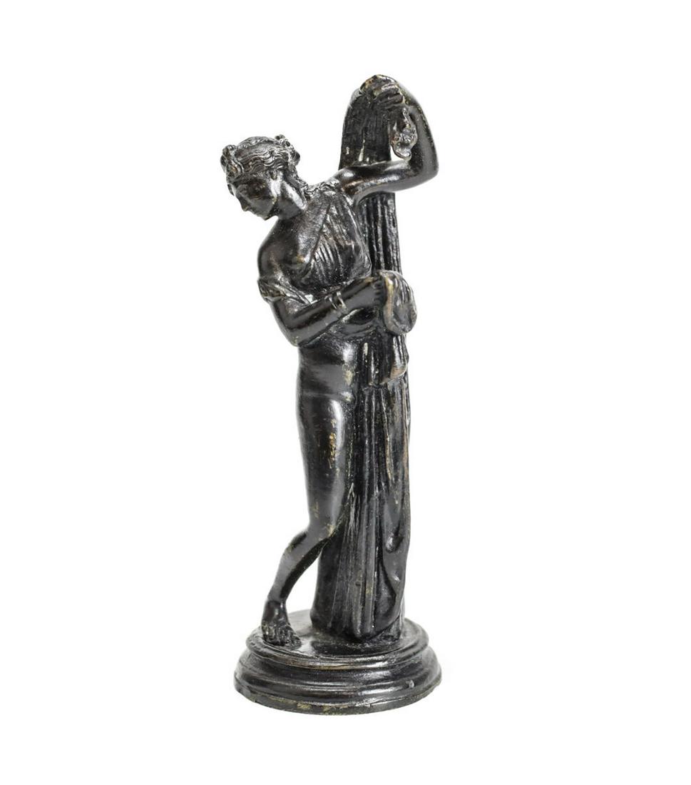 Continental Venus Callipyge Bronze Statuette, dark bronze patina 19th century: Continental Venus Callipyge cast Bronze Statuette, dark bronze patina. Also known as the Aphrodite Kallipygos, "Venus of the beautiful buttocks". 75lbs Approx. Measurements: 6" height x 2.125" diamete