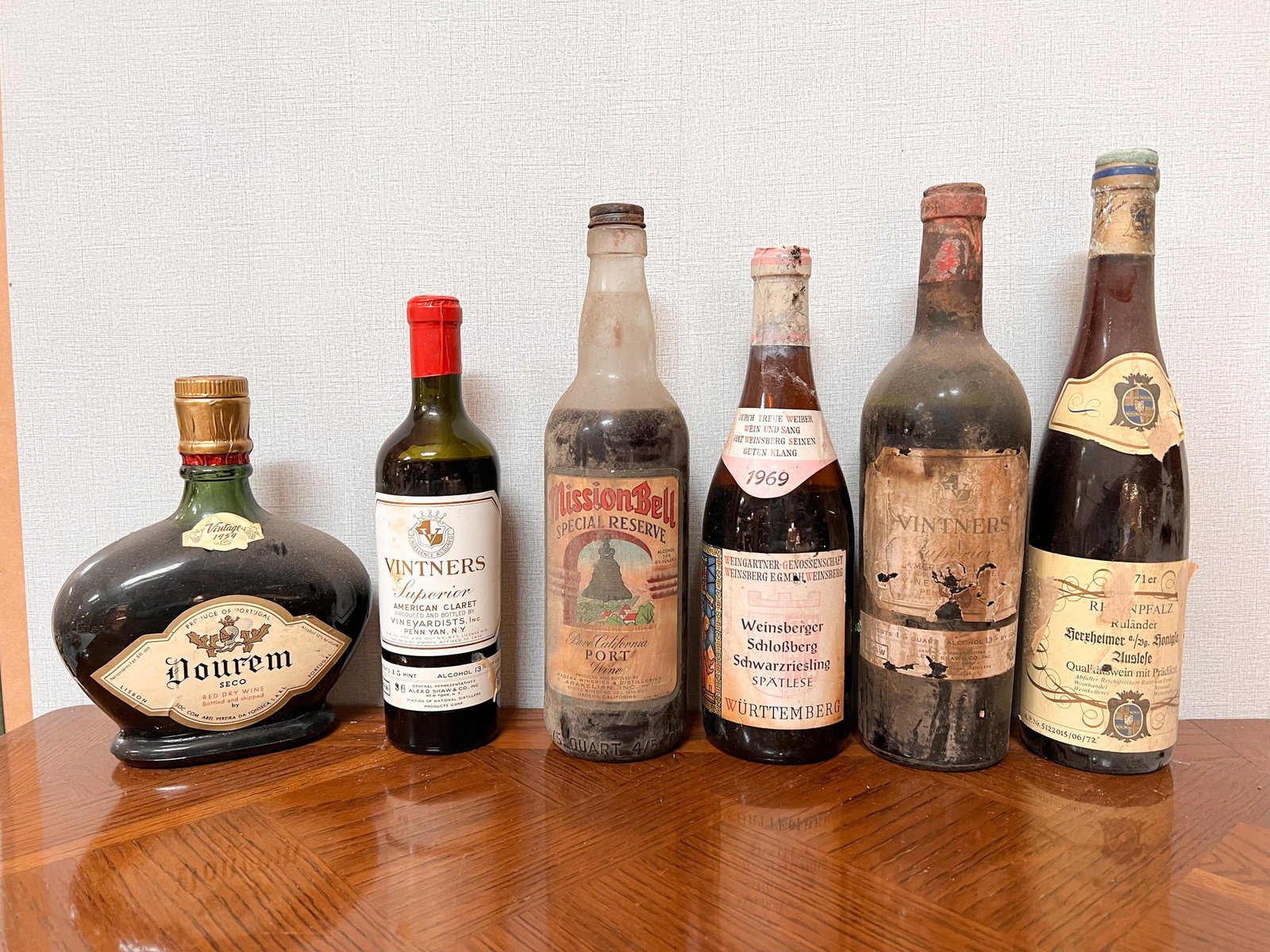 6 Vintage Estate Bottles of Wine Spirits Assorted: Dourem Seco 1959; Vintners Superior; Mission Bell Port; Weinsberger Schlosberg Schwarzriesling 1969; Vintners Superior Domestic Shipping: Please Inquire
