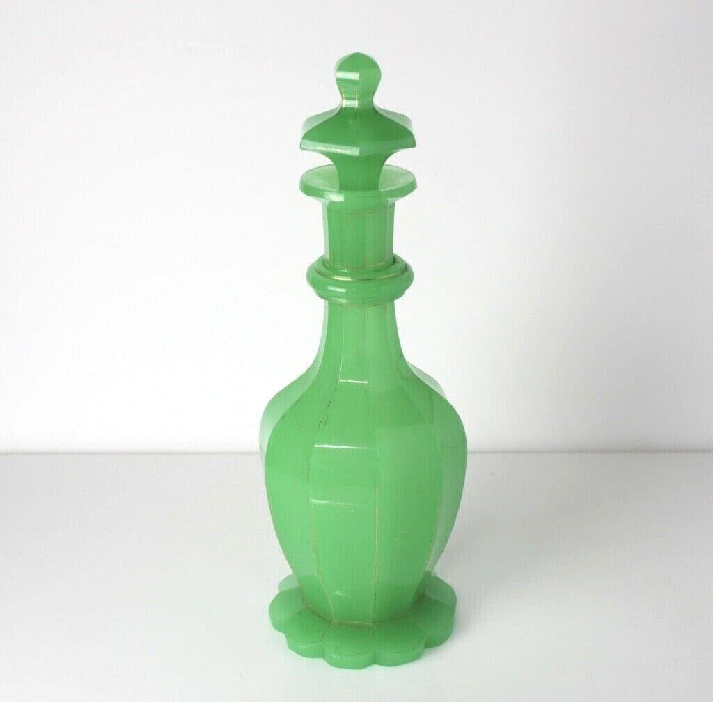 19th century Green French Opaline Cut Glass Decanter - stunning color: 19th century Green French Opaline Cut Glass Decanter - stunning color, fluted form. Scalloped foot, gilt details. Fluorescent. 2.5lbs Approx. Measurements: 12in. height. Domestic Shipping: $40