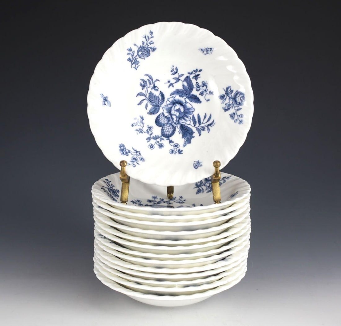 14pc Royal Worcester Blue Spray Berry Bowls, 5 1/2in, White plate, swirl fluted: 14pc Royal Worcester Blue Spray Berry Bowls, 5 1/2", White plate, swirl fluted rim, blue floral design. 5lbs Approx. Measurements: 5.5" diameter x 1.25" deep. Domestic Shipping: $25