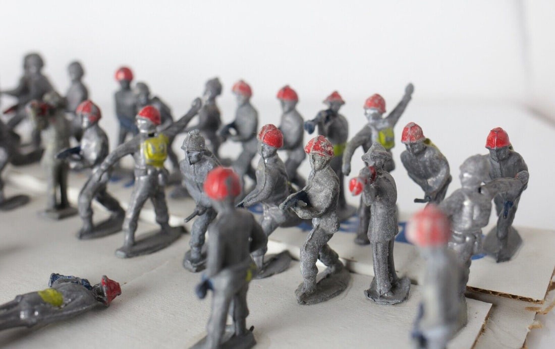 c1940s Set of 38 Metal Lead Die-Cast Toy Soldiers WWII era costumes: c1940s Set of 38 Metal Lead Die-Cast Toy Soldiers, WWII era costumes. Some paint. Most glued to cardboard 3lbs. NOT APPROPRIATE FOR CHILDREN. Approx. Measurements: 2" tall upright Condition: Overall,