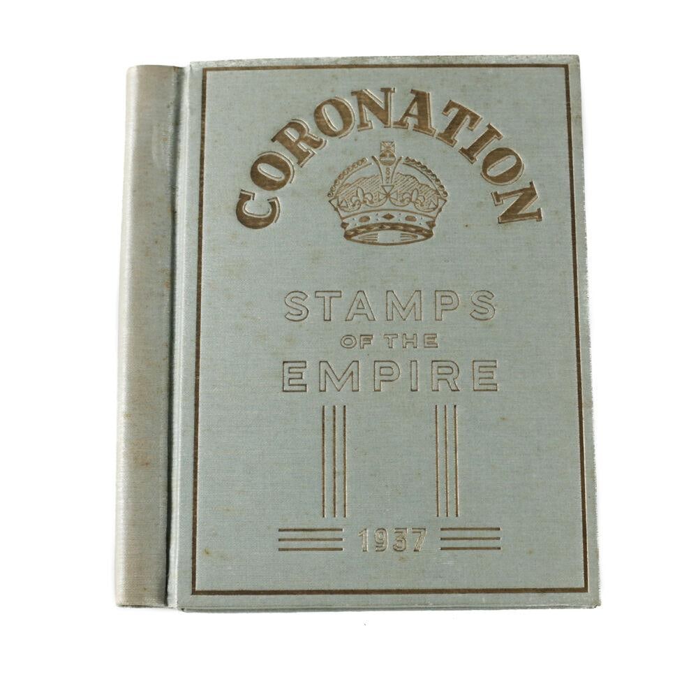 Coronation Stamps of the Empire 1937 Album GF Rapkin George VI Queen Elizabeth: Coronation Stamps of the Empire 1937 Album, G.F. Rapkin, stamps to commemorate the crowning of King George VI and Queen Elizabeth, 12th May 1937. Gilt embossed cover on light green grosgrain cloth. Va
