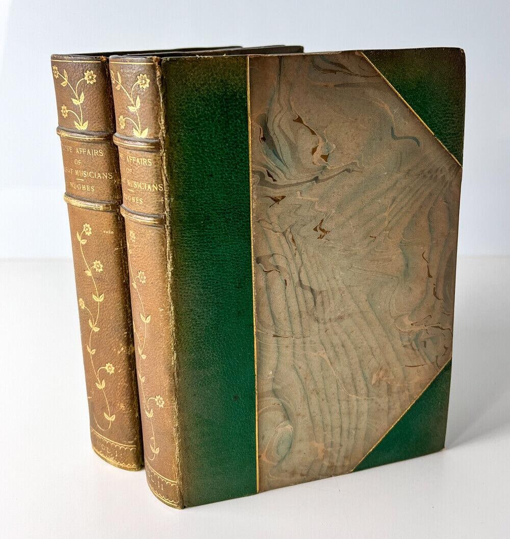 Rupert Hughes The Love Affairs of Great Musicians two vols Illustrated 1903: Rupert Hughes, The Love Affairs of Great Musicians, in two volumes, Illustrated. Published L.C. Page & Co. Boston 1903. Half green leather on marbled boards, gilt title and embellishments on spine, ra