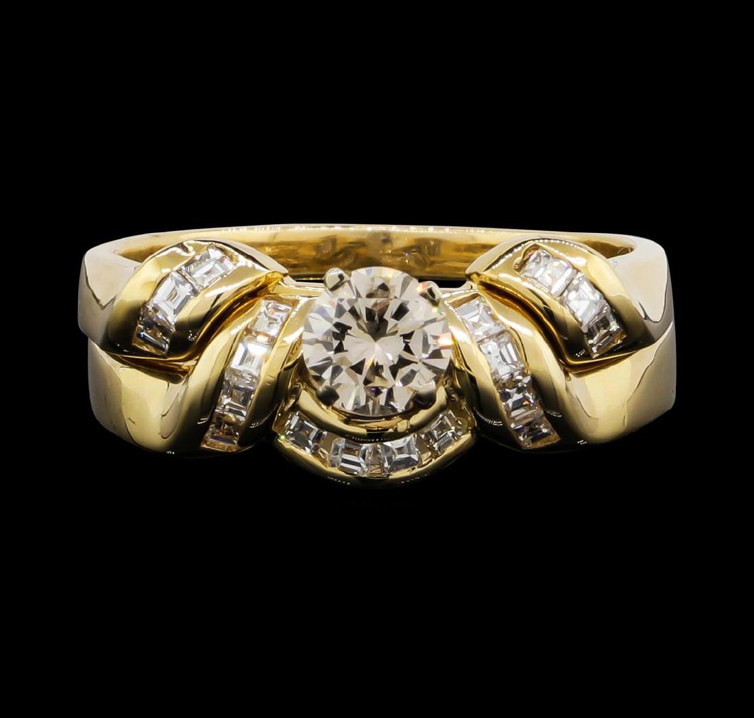 14KT Yellow Gold 0.75ctw Diamond Wedding Ring Set: One Ladies wedding ring set featuring: 14KT yellow gold weighing 5.8 grams containing one center diamond weighing 0.43ct and side diamonds weighing 0.32ctw.