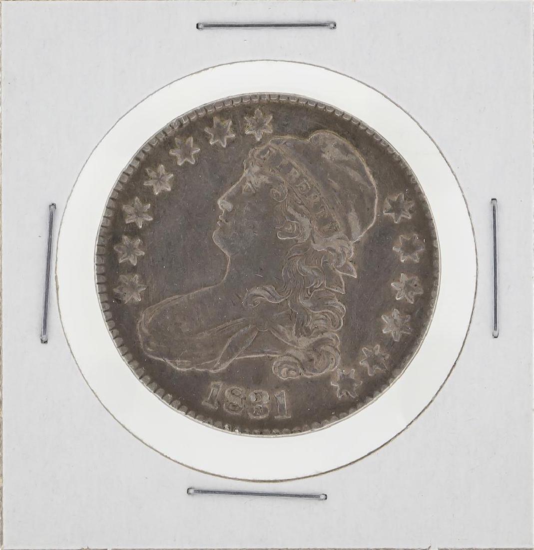 1831 Capped Bust Half Dollar Coin: One 1831 Capped Bust Half Dollar Coin.