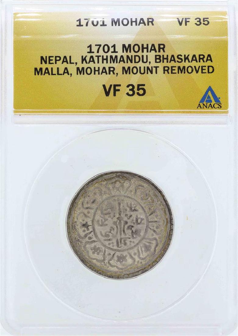 1701 Nepal Kathmandu Mohar Coin ANACS VF35: One 1701 Nepal Kathmandu Mohar Coin ANACS VF35. ANACS Certified.